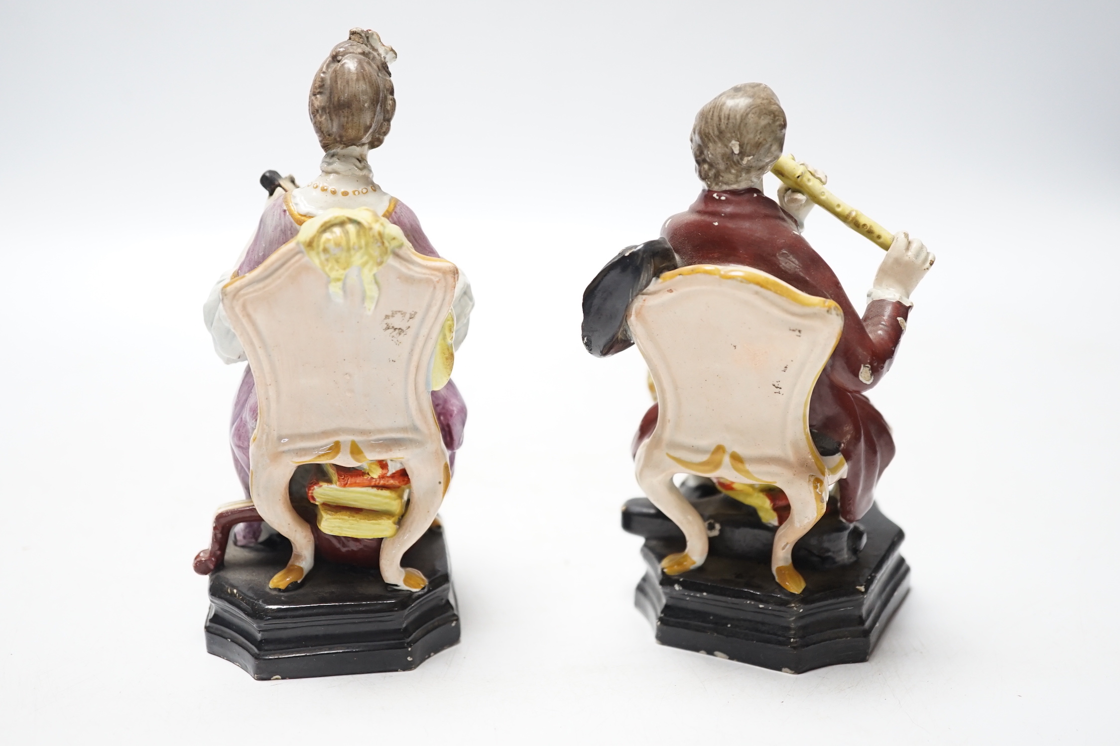 A pair of Staffordshire pearlware figures of musicians seated on chairs, c.1825, 14cm